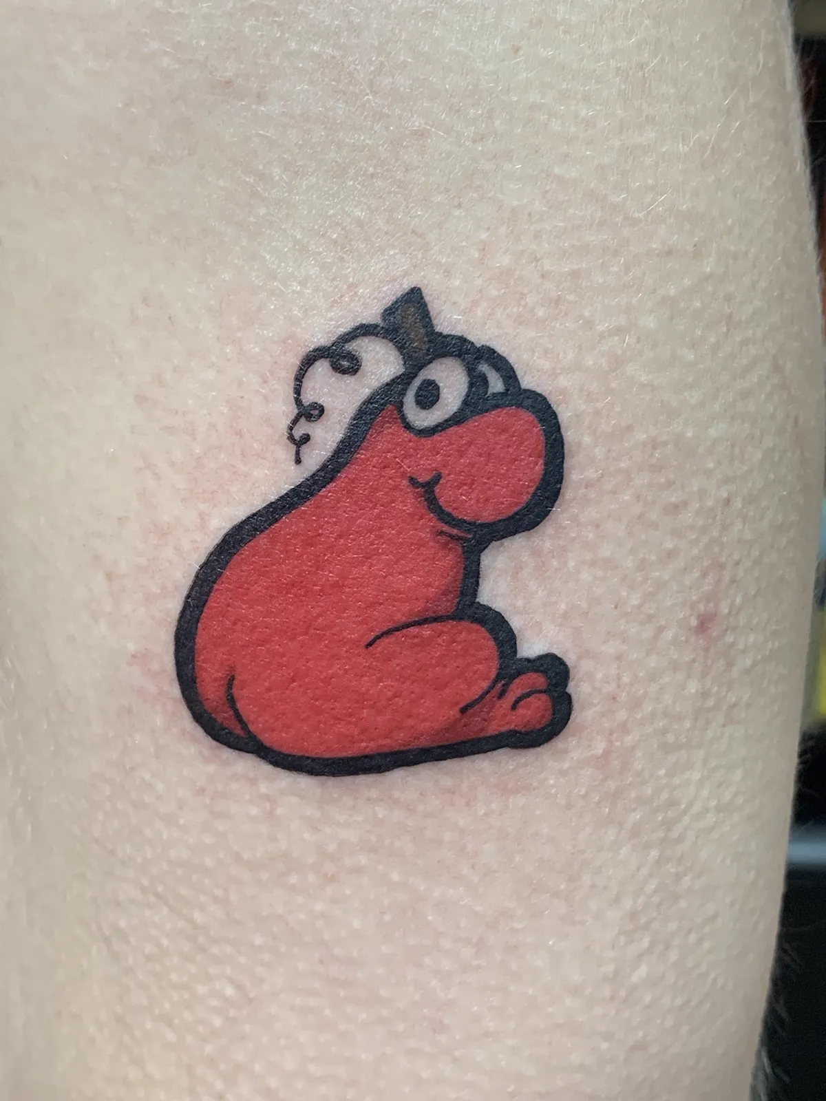Red cartoon character tattoo by Sav