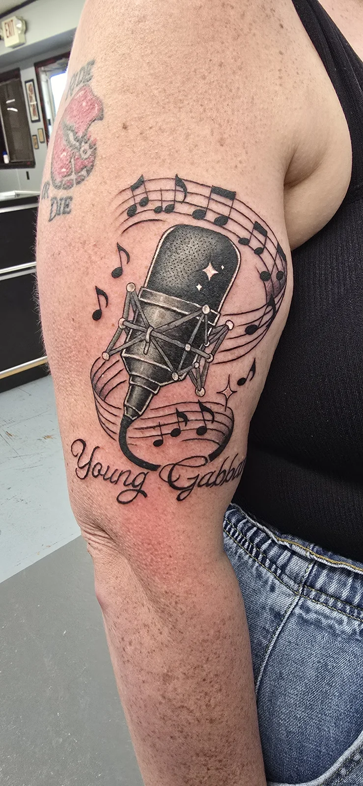 Vintage microphone tattoo by Branded Key Tattoo