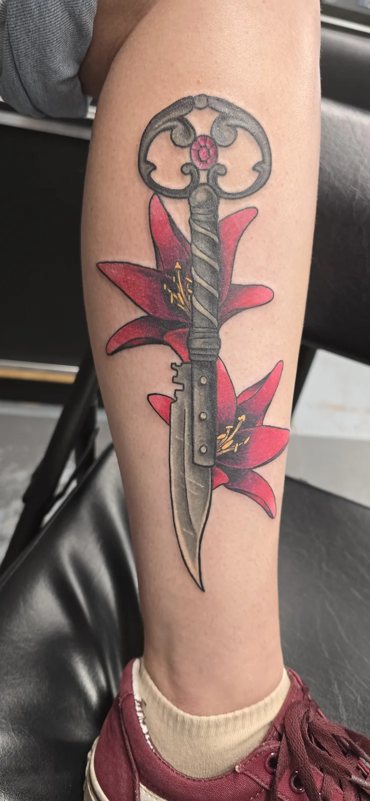 Traditional dagger tattoo by Branded Key Tattoo
