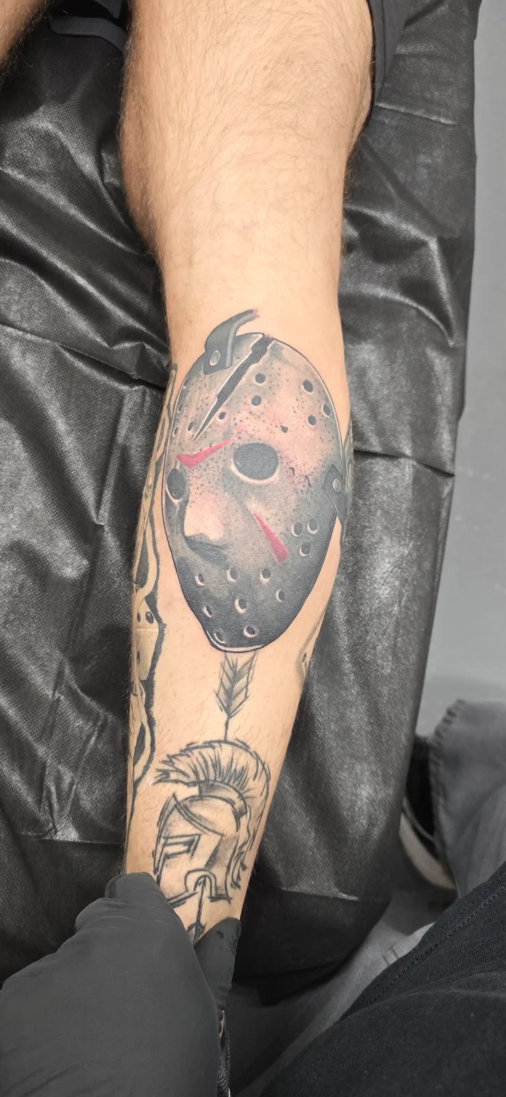 Illustrative moon and clock leg tattoo by Joshua Key