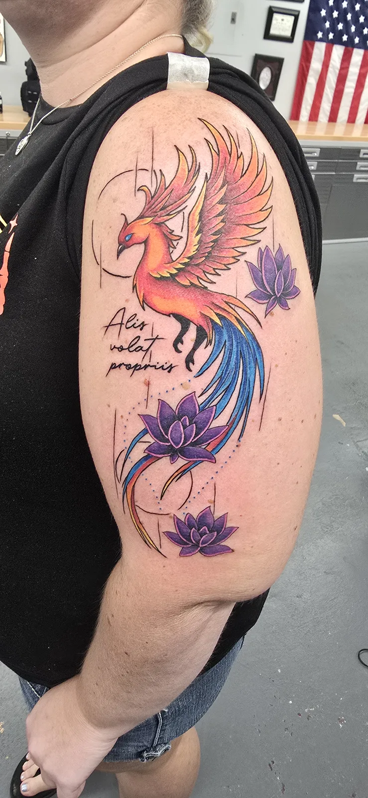 Color phoenix shoulder tattoo by Joshua Key