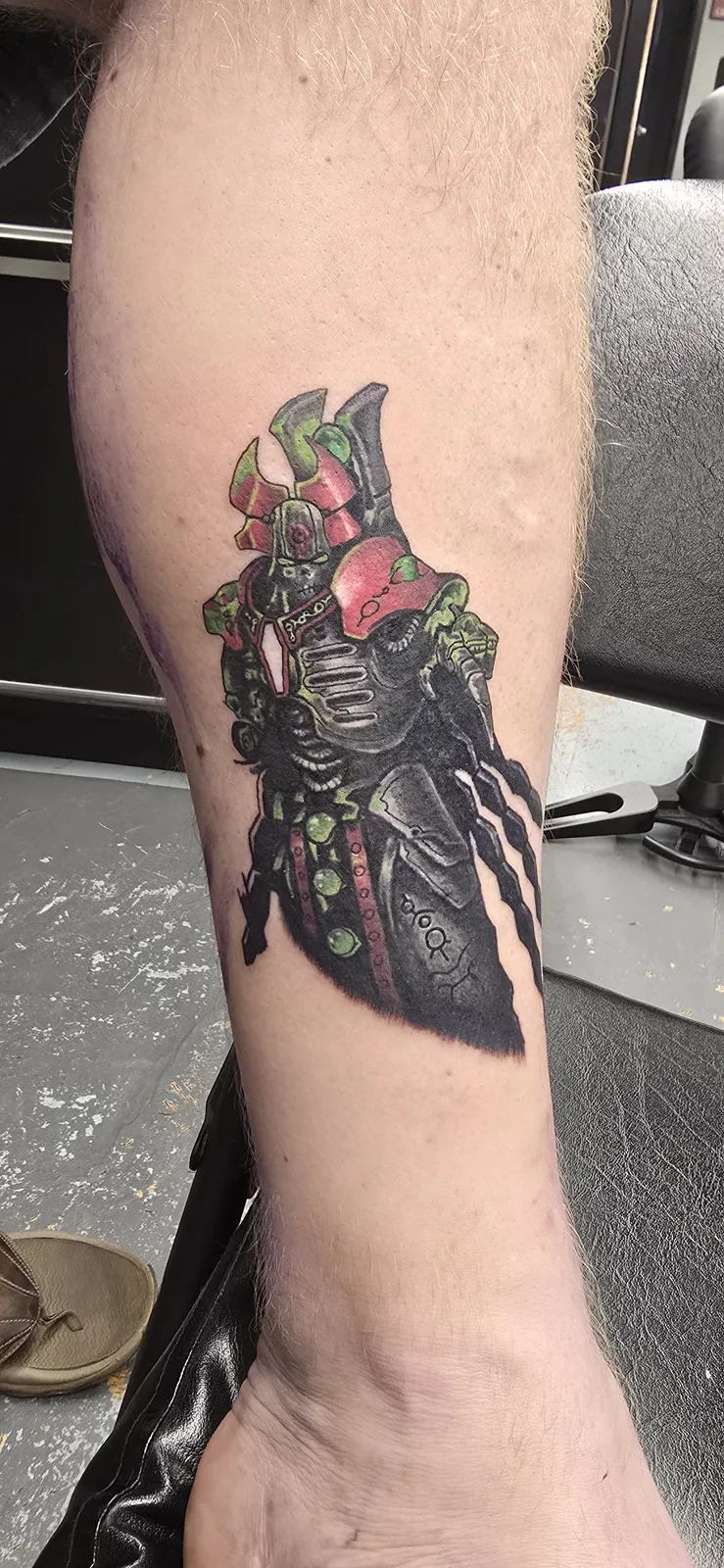 Anatomical heart and dagger leg tattoo by Joshua Key